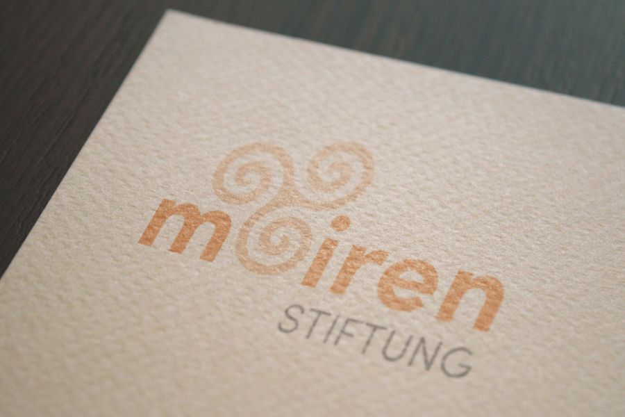 Logo Gestaltung auf Spezialpapier